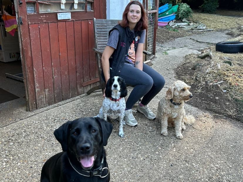 Robyn sitting with dogs